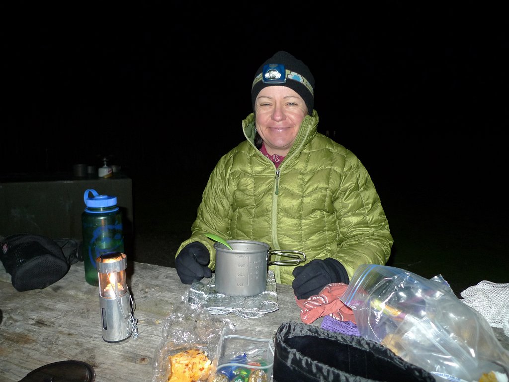 WildcatCamp 011.JPG - Barbara having her (eventually ice cold) soup.I tried to have mashed potatoes and turkey, but didn't quite have enough time to figure out how to warm them up, so I just made two ready ziplock bags. I noticed that the water was getting little murky, looked closers, and yest indeed.  The bag with mashed potatoes stack to the bottom of the pot and all of a sudden the bag had two openings. What a mess. I wanted turkey ala cart, anyway...